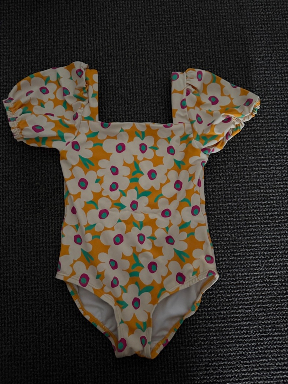 Hanna Andersson girl's one-piece swimsuit in Bold Poppy on Radiant Yellow 4T 5T